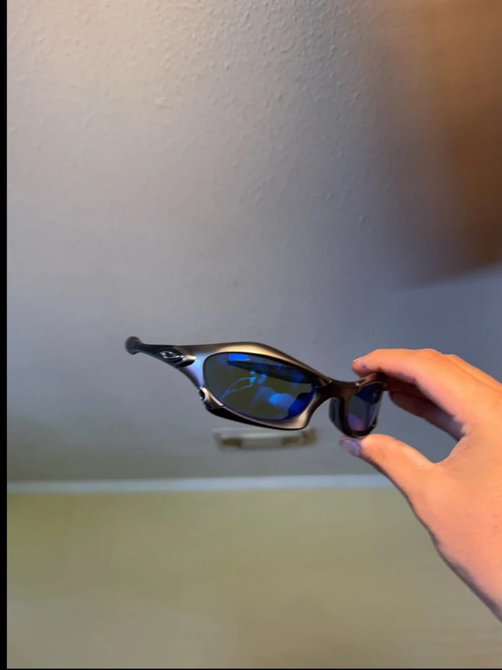 Black Sunglasses with Blue Mirrored Lenses Oakleys